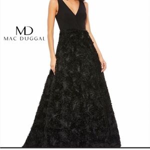 MacDuggal evening gown/black w/raised roses on skirt.